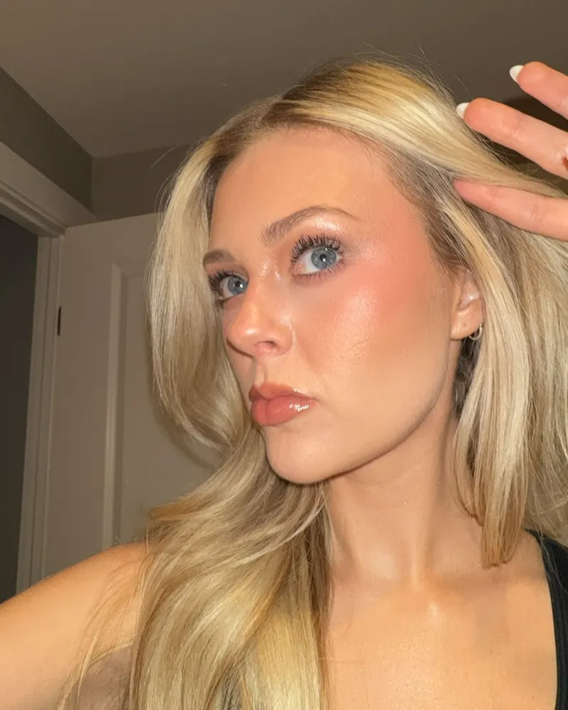 Haley posing, hand at her forehead